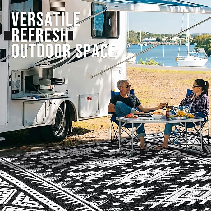 OLANLY Outdoor Rug Waterproof 4x6 ft, Reversible Outdoor Plastic Straw Rug, Boho Patio Rug, Indoor Outdoor Carpet, RV Mat Outside for Patio, Camp, Picnic, Balcony, Deck, Backyard, Black & White