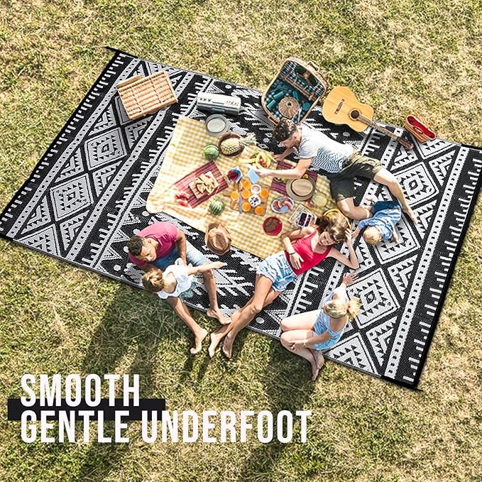 OLANLY Outdoor Rug Waterproof 10x14 ft, Reversible Outdoor Plastic Straw Rug, Boho Patio Rug, Indoor Outdoor Carpet, RV Mat Outside for Patio, Camp, Picnic, Balcony, Deck, Backyard, Black & White