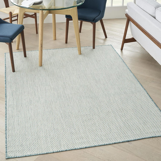 Nourison Home Courtyard 48" x 72" Fabric Indoor/Outdoor Rug in Ivory Aqua
